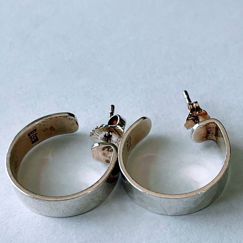 Mix of two retired James Avery hoops. One smooth, one a slightly hammered look.